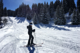 A private ski lesson for an intermediate skier