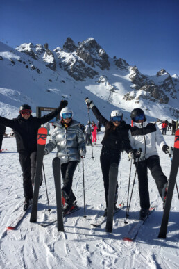 Skiers having fun on the Biollay piste in Courchevel